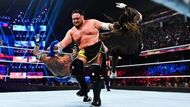 The Samoan Submission Machine takes out both Rey Misterio and R Truth at the same time.